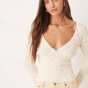 NWT AWARE stretchy jacquard knit bell sleeve wrap detail top in cream BOHO L